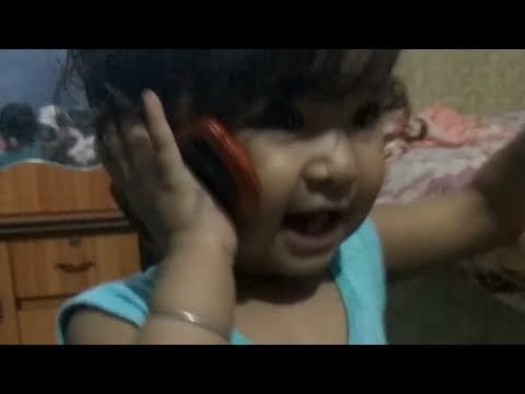 My angel, taking on phone with mamma 