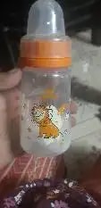 2-in-1 Baby Feeding Bottle | BPA Free with Anti-Colic Nipple & Spoon | Easy Flow Neck Design - Lion & Giraffe 125ml & 250ml