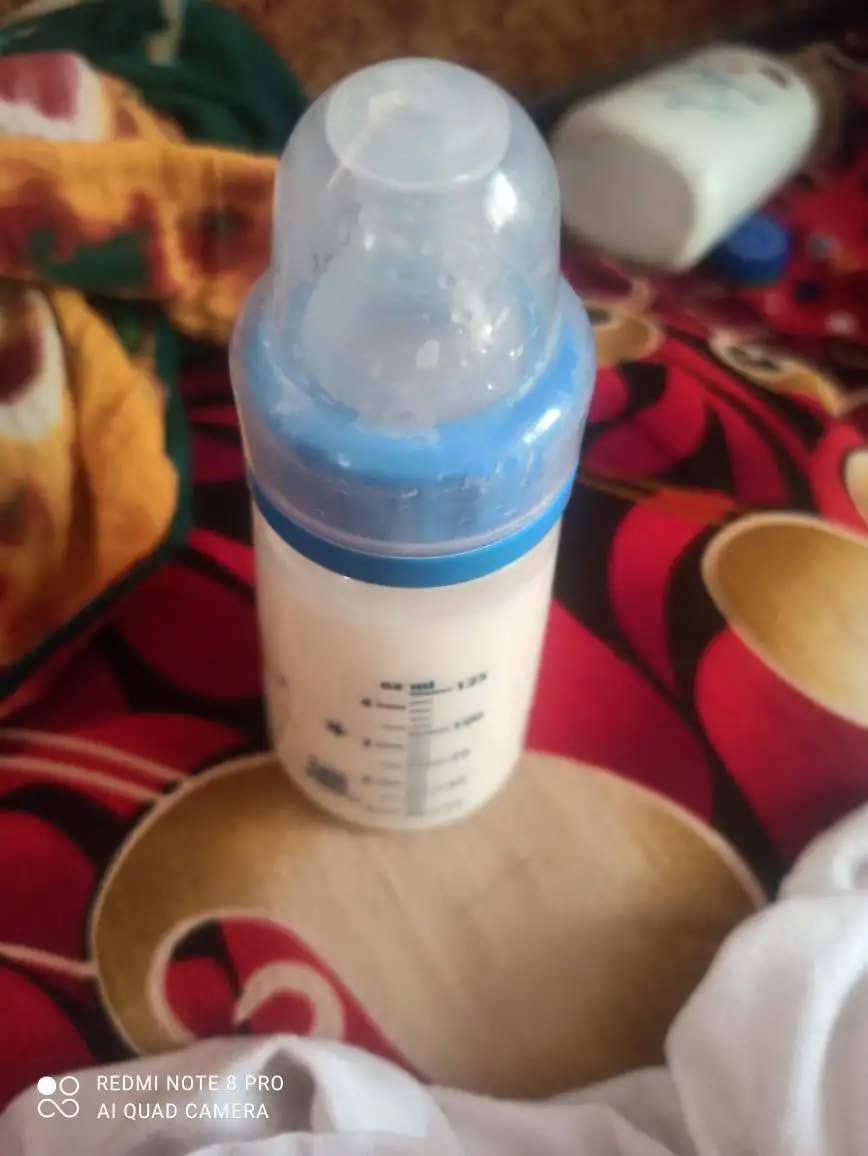 2-in-1 Baby Feeding Bottle | BPA Free with Anti-Colic Nipple & Spoon | Easy Flow Neck Design - Lion & Giraffe 125ml & 250ml