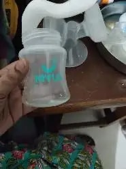 Manual Breast Pump For Feeding Mothers | Anti Colic & BPA Free | Compact & Lightweight | Easy to hold | Easy to Clean | With Bottle (150 ml)