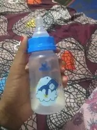 2-in-1 Baby Feeding Bottle | BPA Free with Anti-Colic Nipple & Spoon | Easy Flow Neck Design - Lion & Giraffe 125ml & 250ml