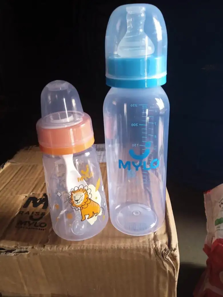 2-in-1 Baby Feeding Bottle | BPA Free with Anti-Colic Nipple & Spoon | Easy Flow Neck Design - Lion & Giraffe 125ml & 250ml