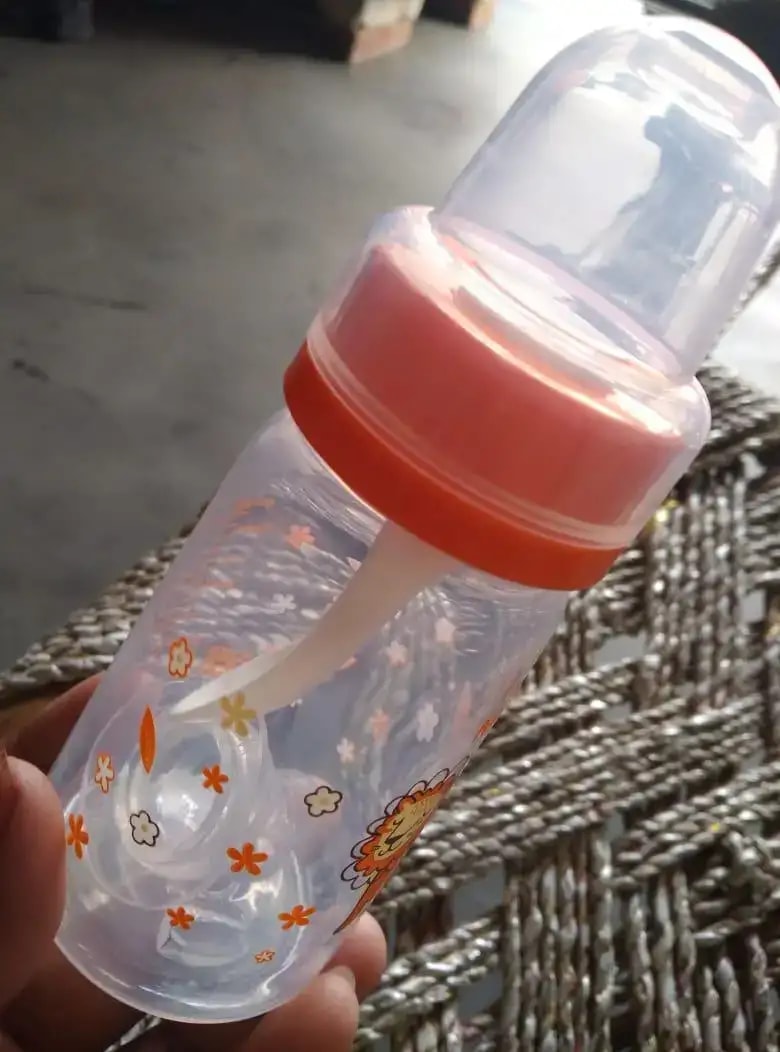 2-in-1 Baby Feeding Bottle | BPA Free with Anti-Colic Nipple & Spoon | Easy Flow Neck Design - Lion & Giraffe 125ml & 250ml
