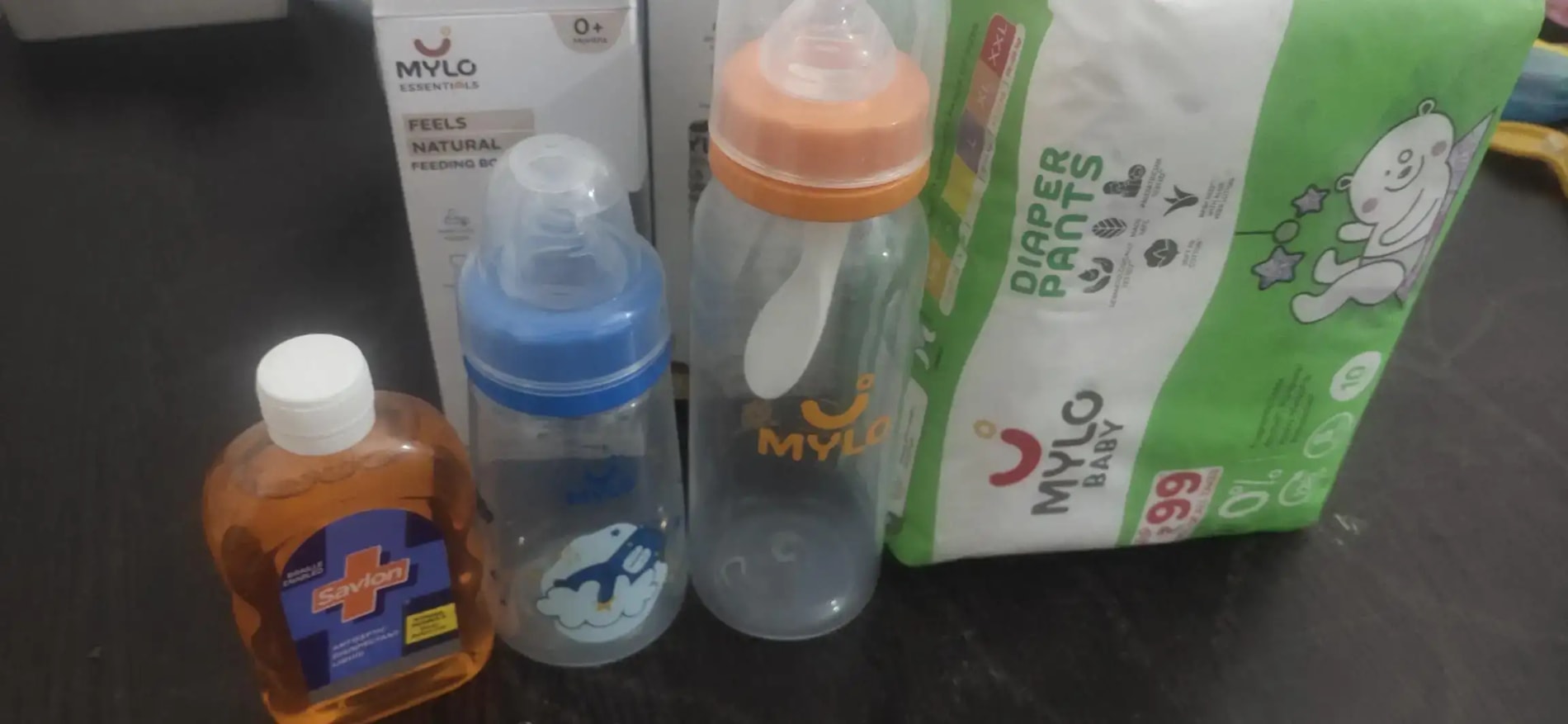 2-in-1 Baby Feeding Bottle | BPA Free with Anti-Colic Nipple & Spoon | Easy Flow Neck Design - Lion & Giraffe 125ml & 250ml