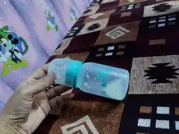 2-in-1 Baby Feeding Bottle | BPA Free with Anti-Colic Nipple & Spoon | Easy Flow Neck Design - Lion & Giraffe 125ml & 250ml